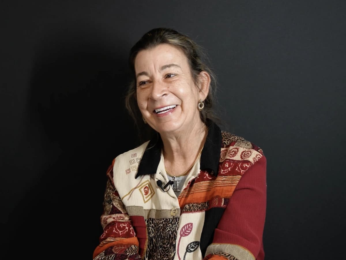 Patient smiling with modern dentures